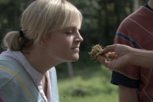 Smelling elephant poo Jeni getting a whiff of 'phant poo